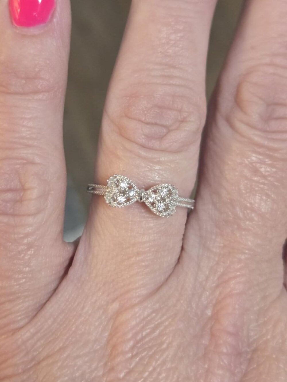 .925 Sterling Silver with White Diamond Cubic Zirconia Infinity Forever Bow Ring - Picture 7 of 10